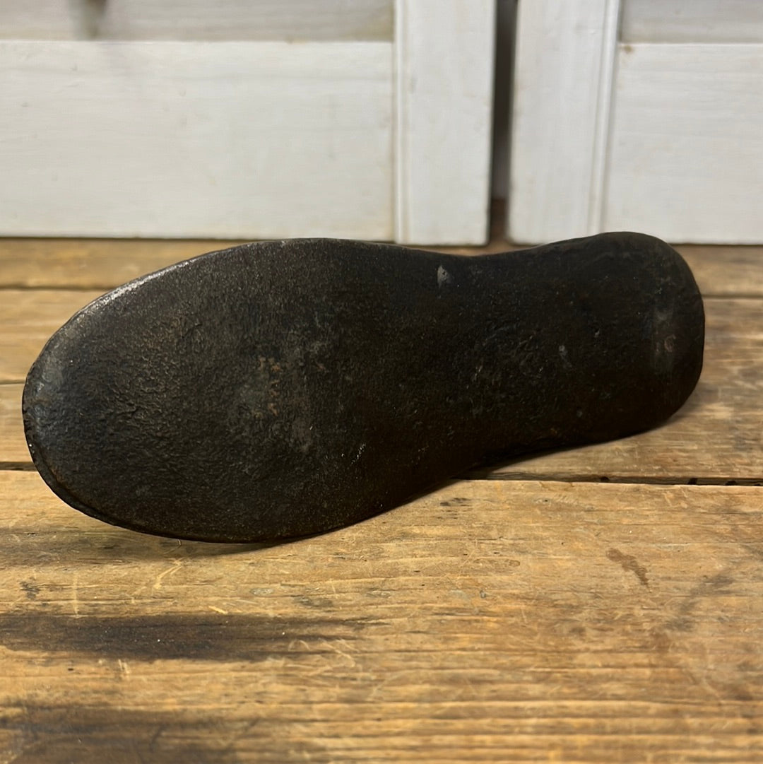 adorable vintage cast iron child size shoe form/ farmhouse decor