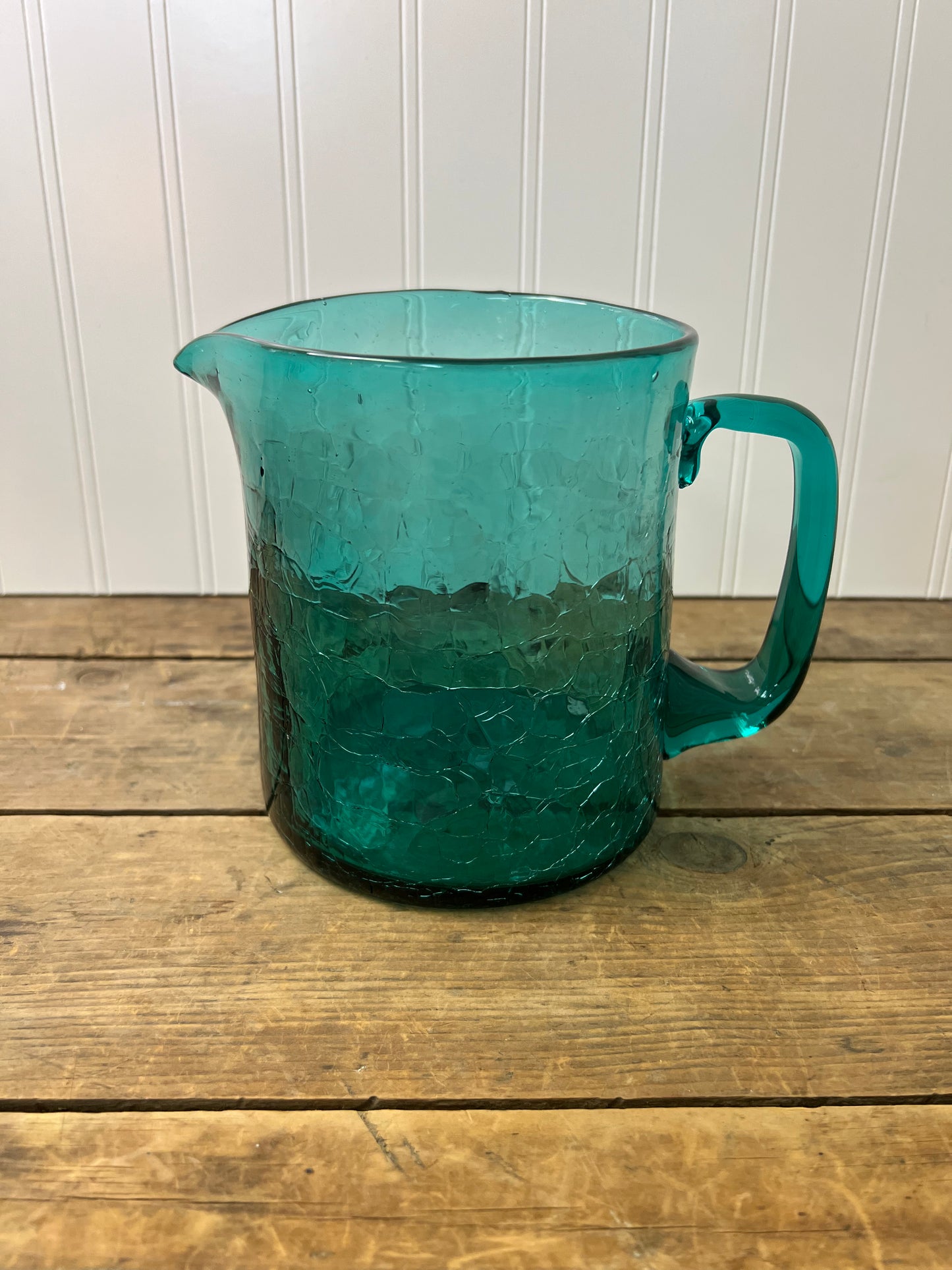 Vintage teal hand blown crackle glass pitcher