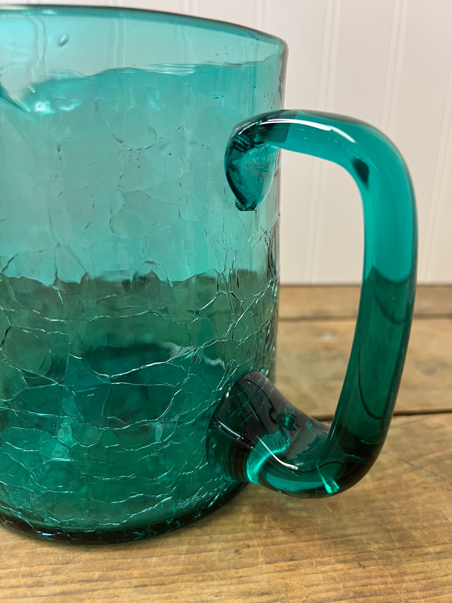 Vintage teal hand blown crackle glass pitcher