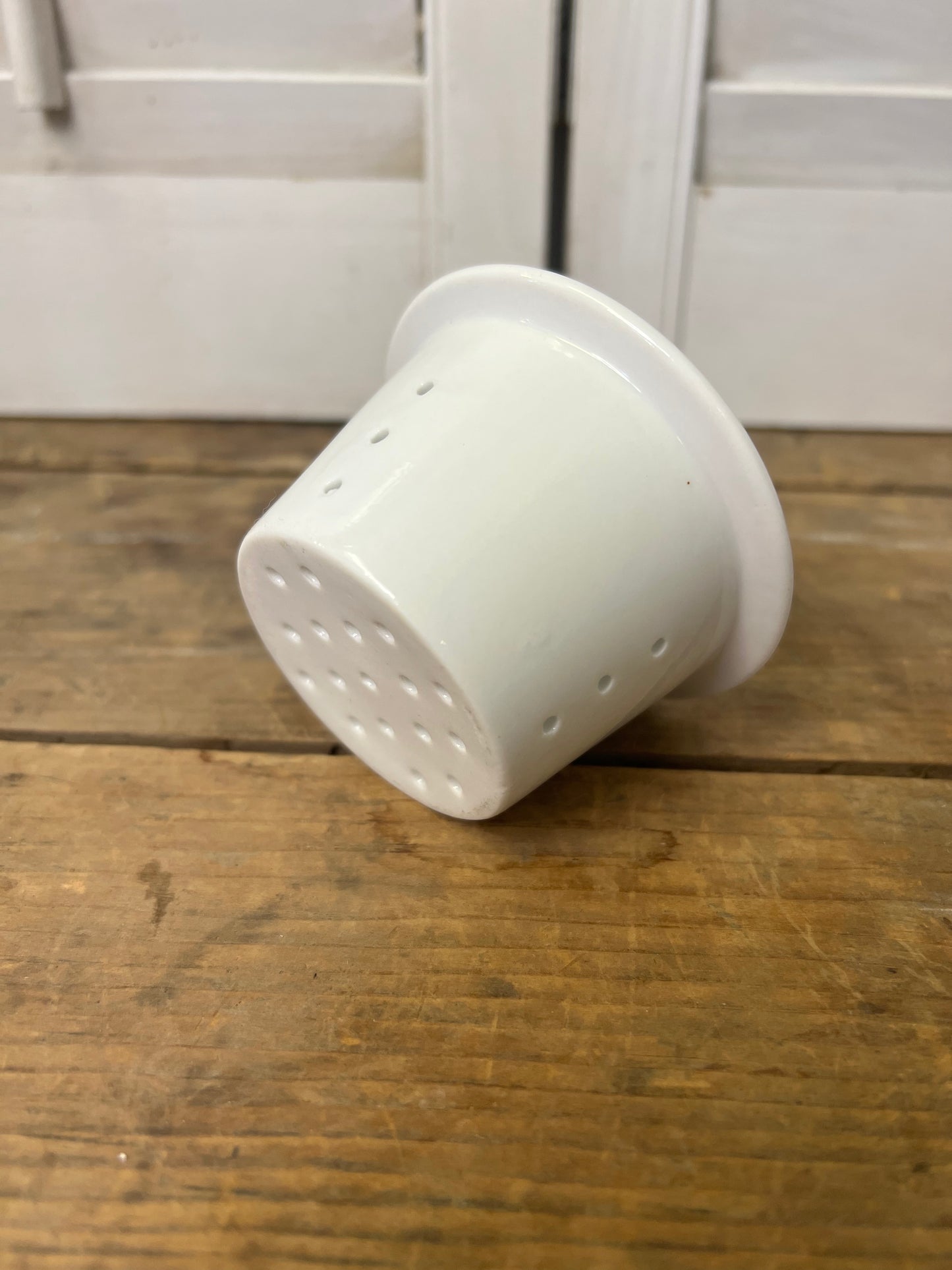 Vintage French porcelain tea strainer