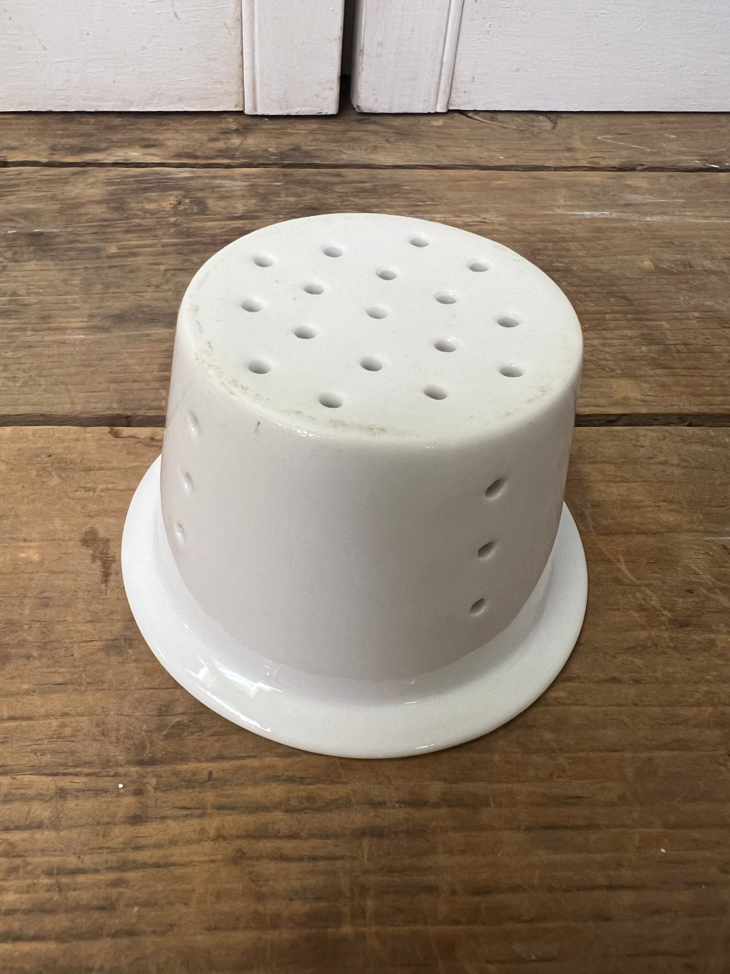 Vintage French porcelain tea strainer