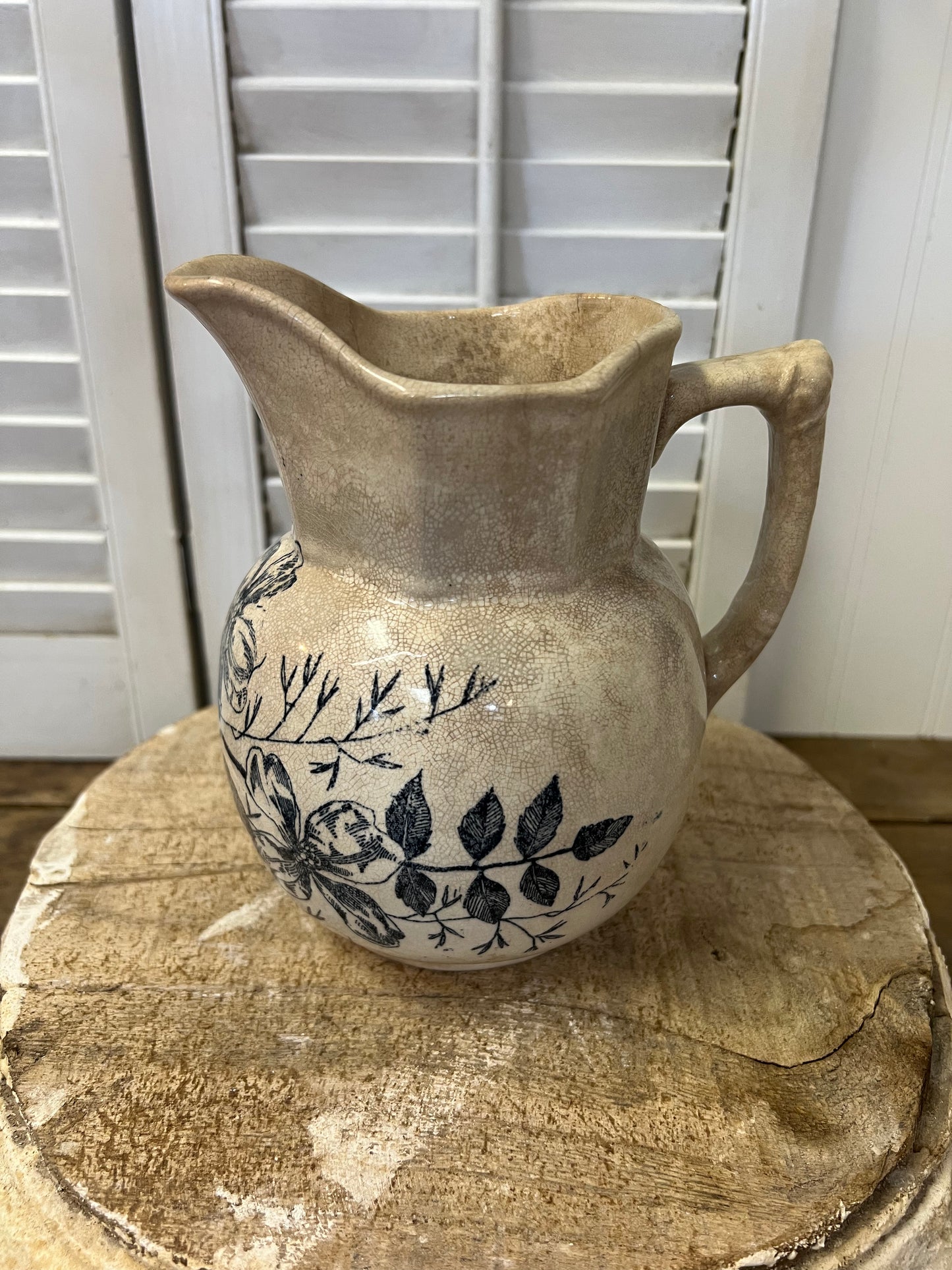 Antique English ironstone blue transferware floral stained and crazed milk pitcher