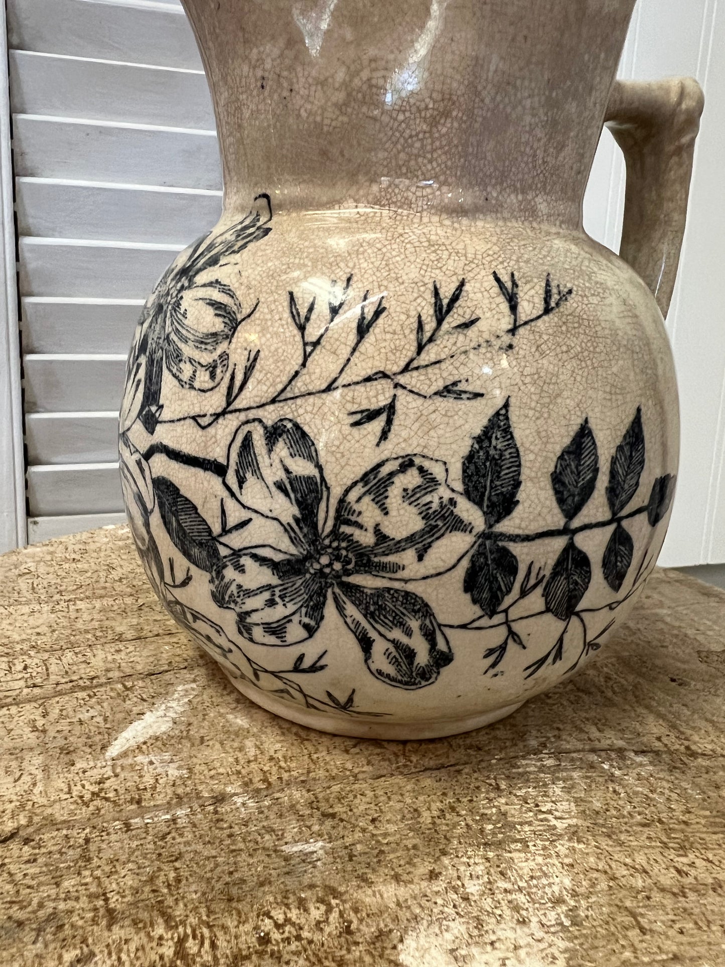 Antique English ironstone blue transferware floral stained and crazed milk pitcher