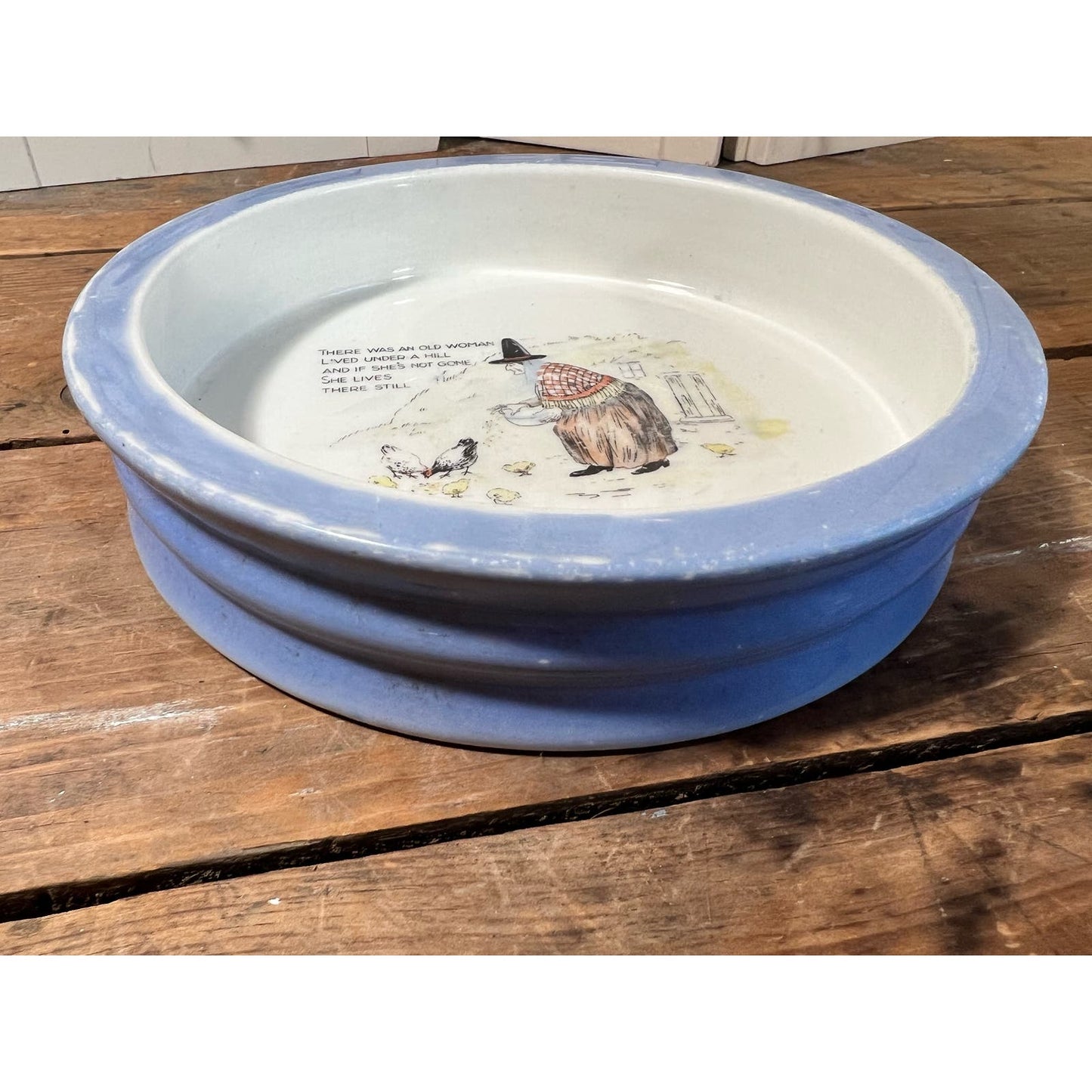“There was an old woman who lived under a hill” porcelain child’s feeding dish