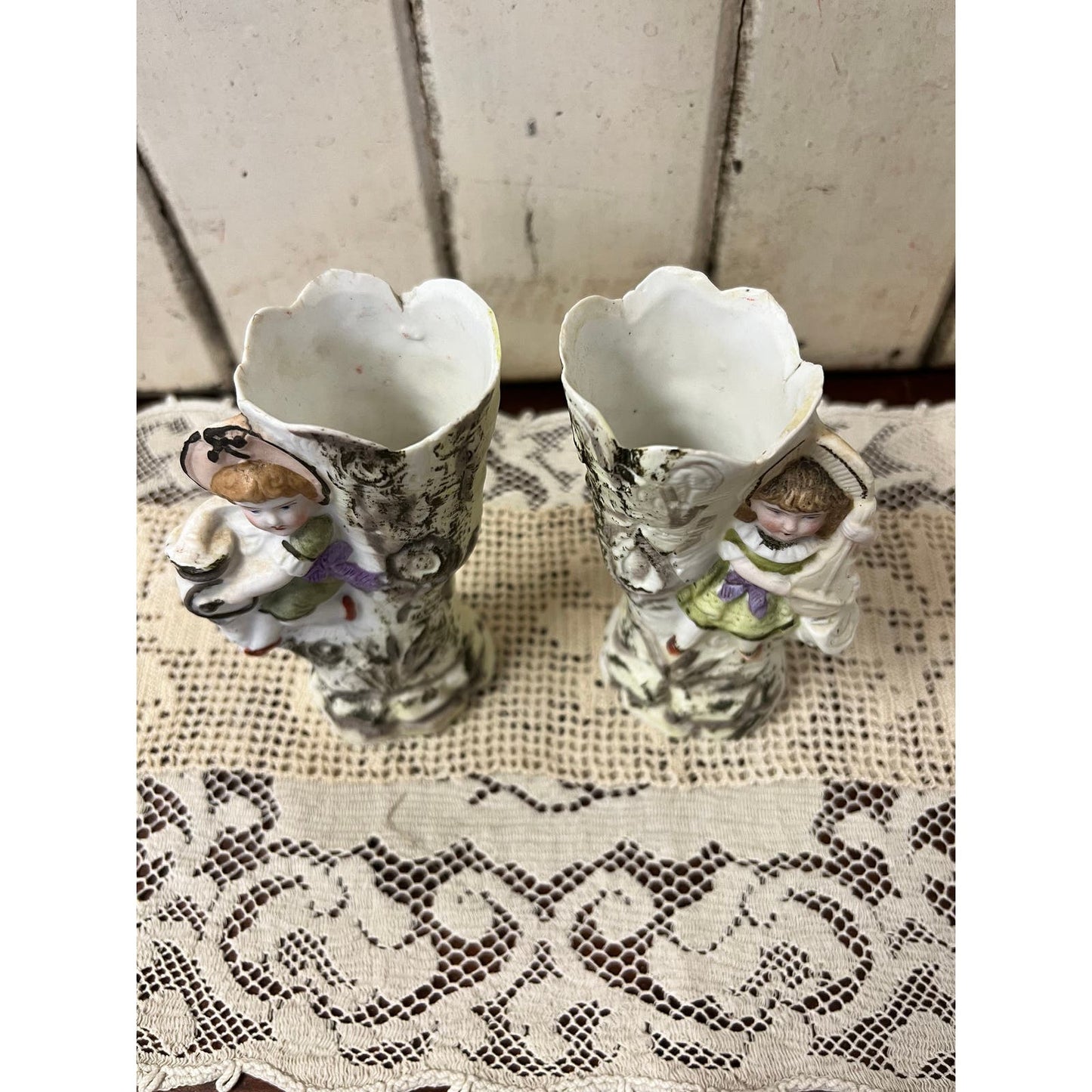 Antique hand painted porcelain pair of vases