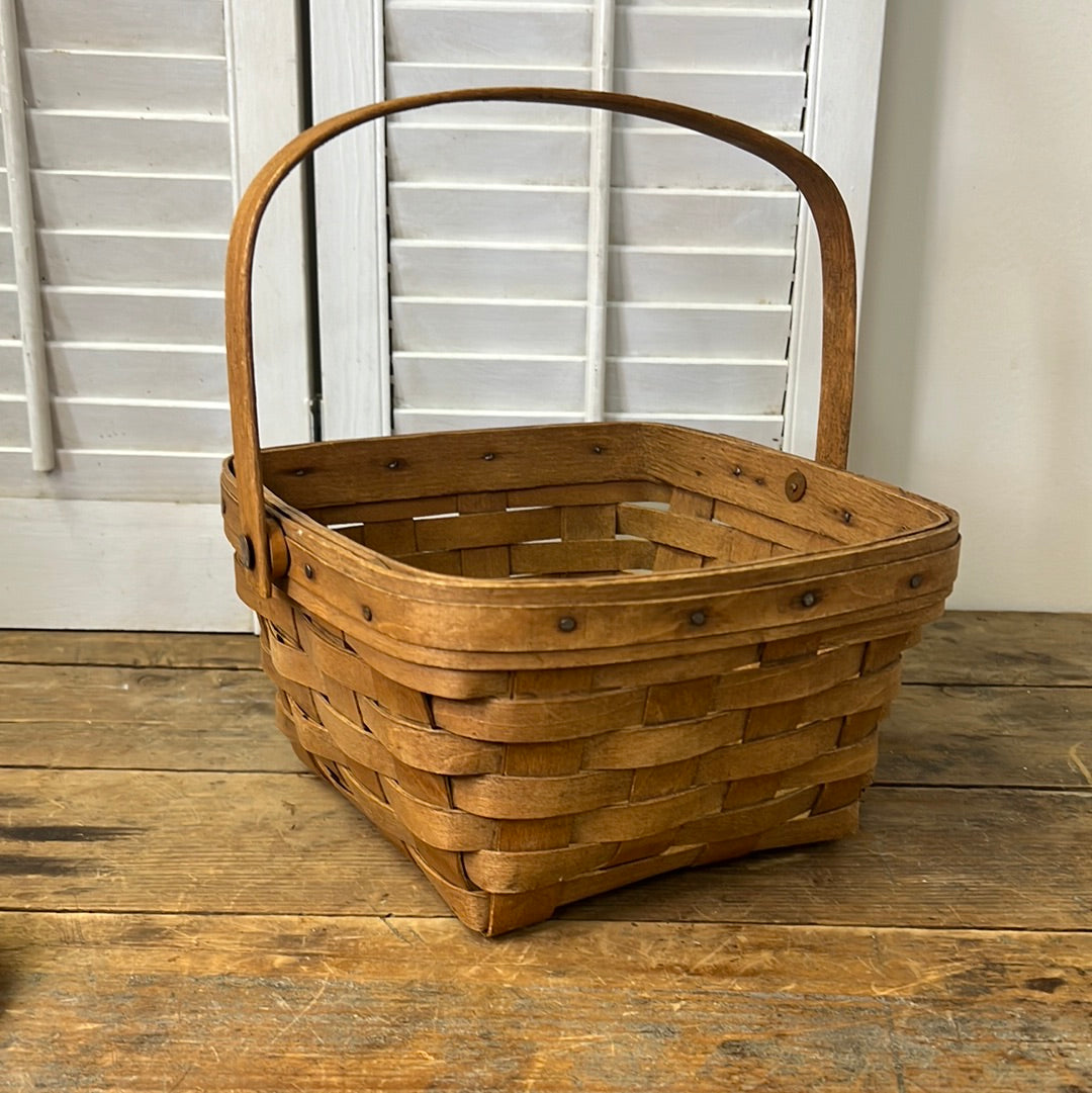 Longaberger 9” square handled basket signed and dated 1985