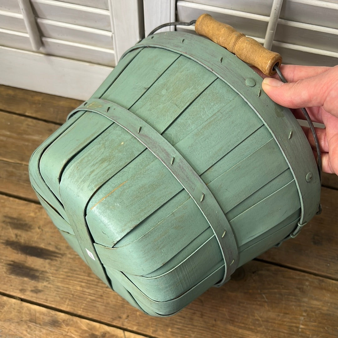 Small blue/green fruit basket with yellow floral fabric liner