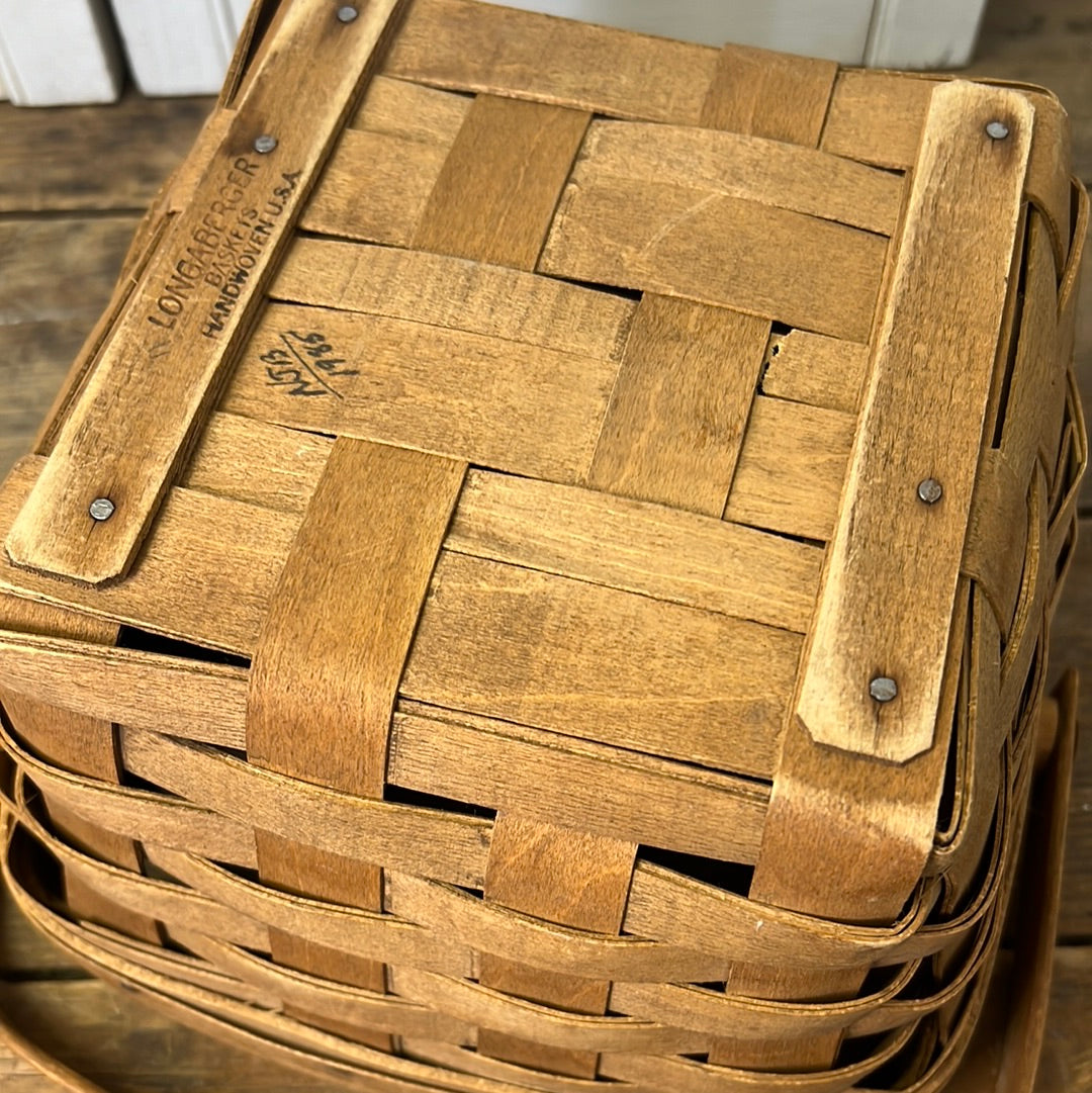 Longaberger 9” square handled basket signed and dated 1985