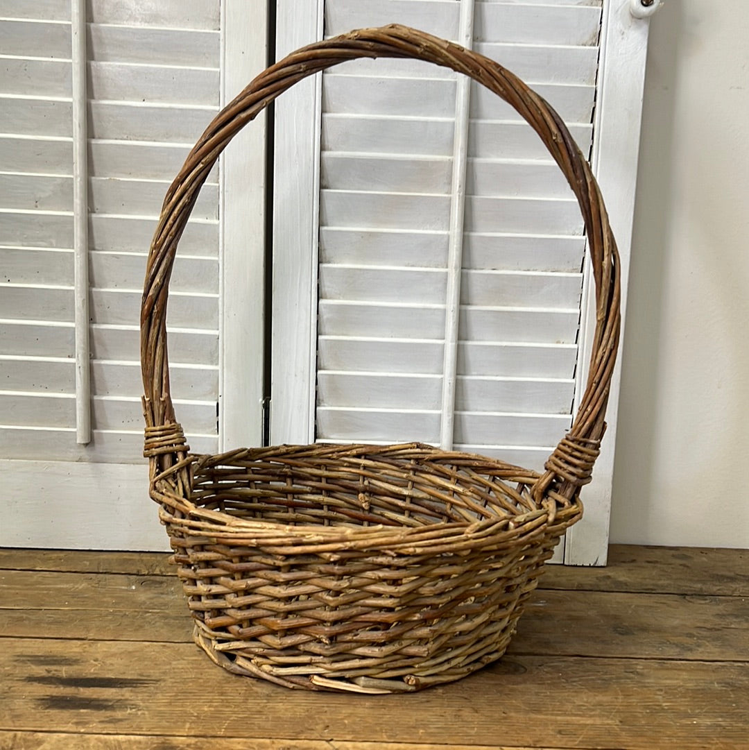 Grapevine woven basket with tall handle