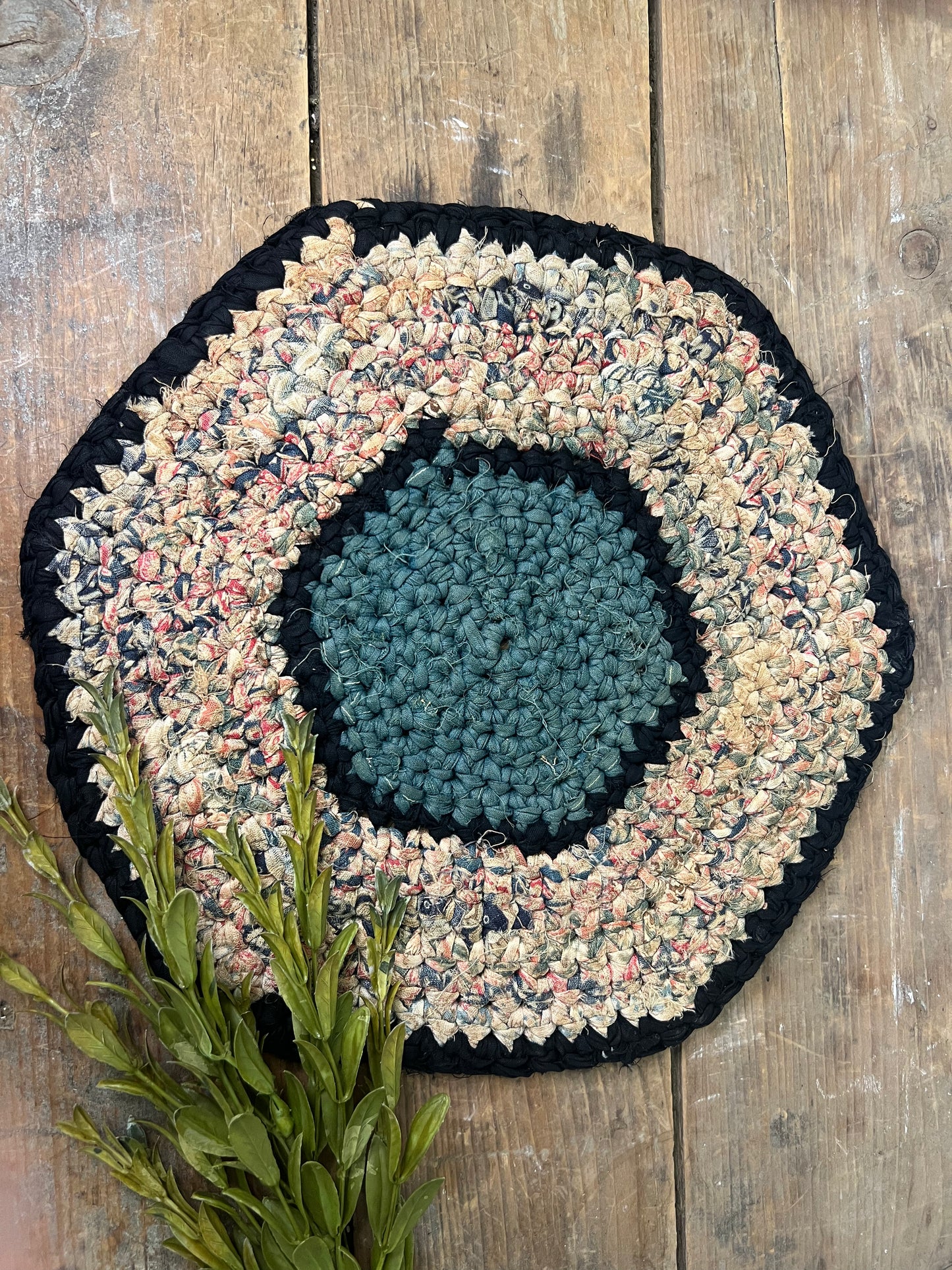 Antique braided table mat