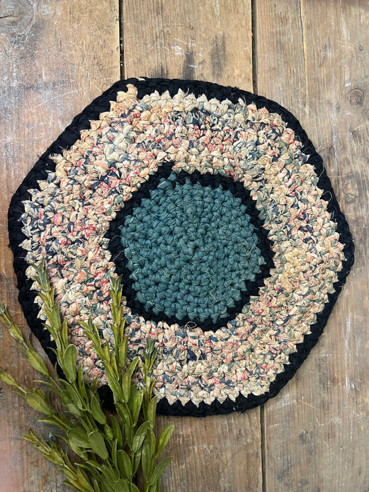 Antique braided table mat