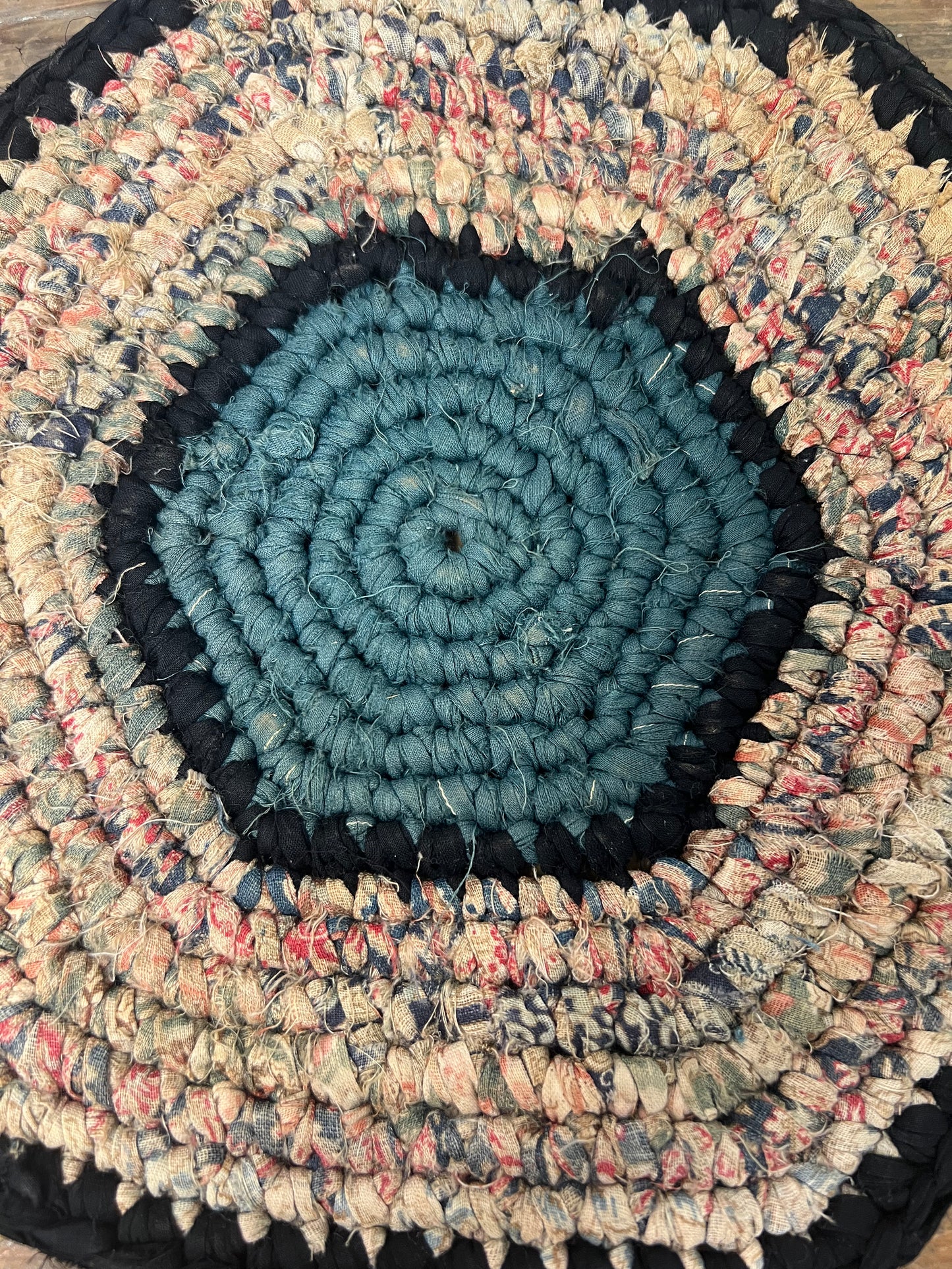 Antique braided table mat