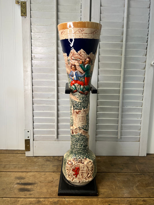 Extra tall vintage German beer stein with black wood stand