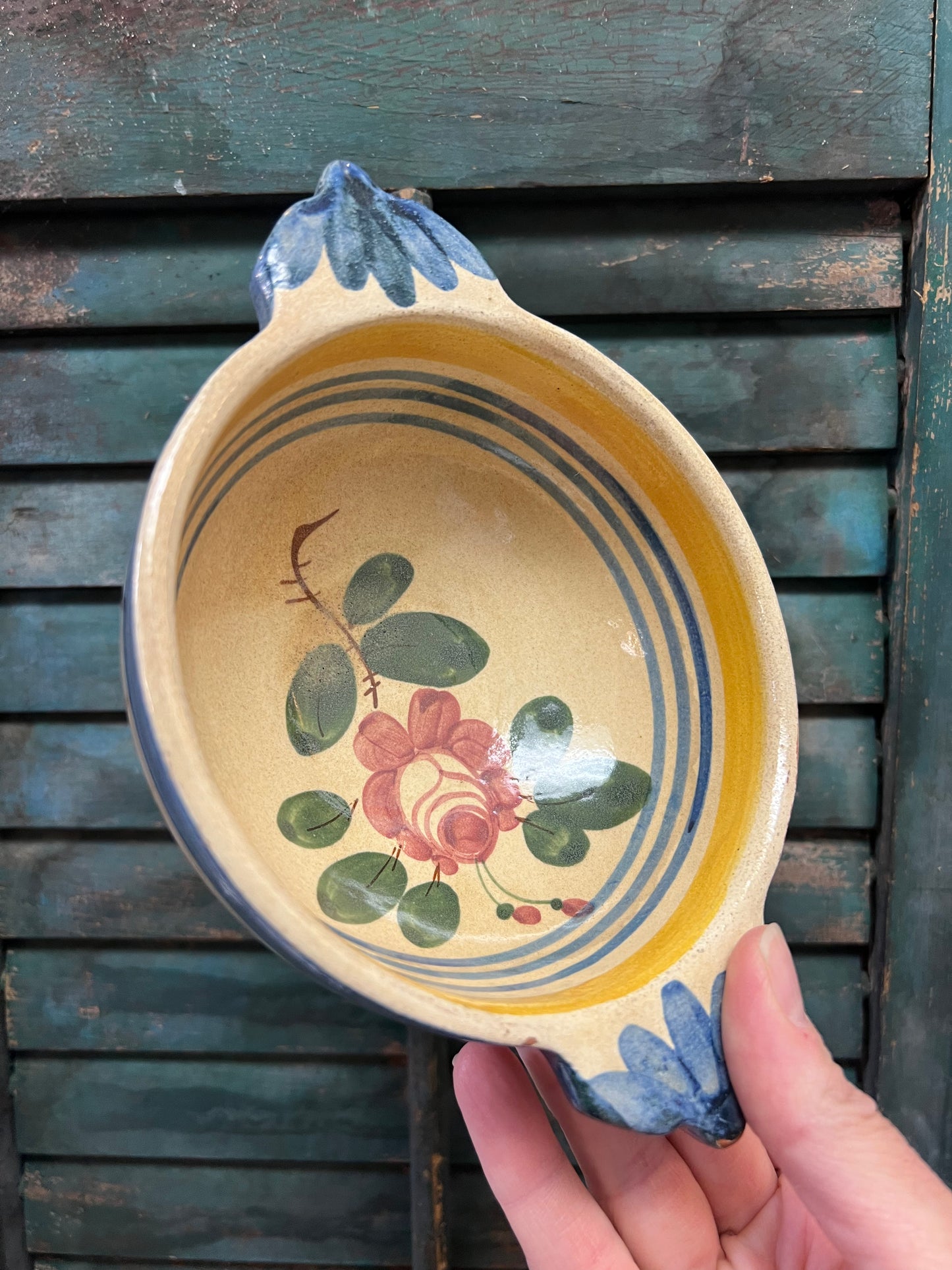 Antique ceramic glazed bowl with hand painted rose design