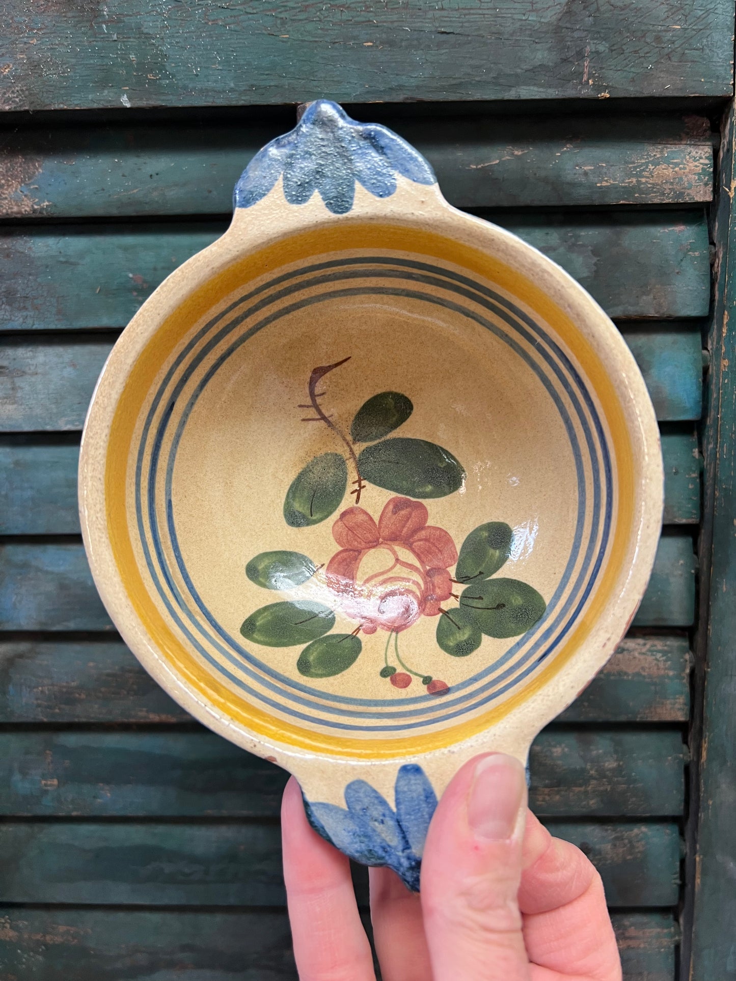 Antique ceramic glazed bowl with hand painted rose design