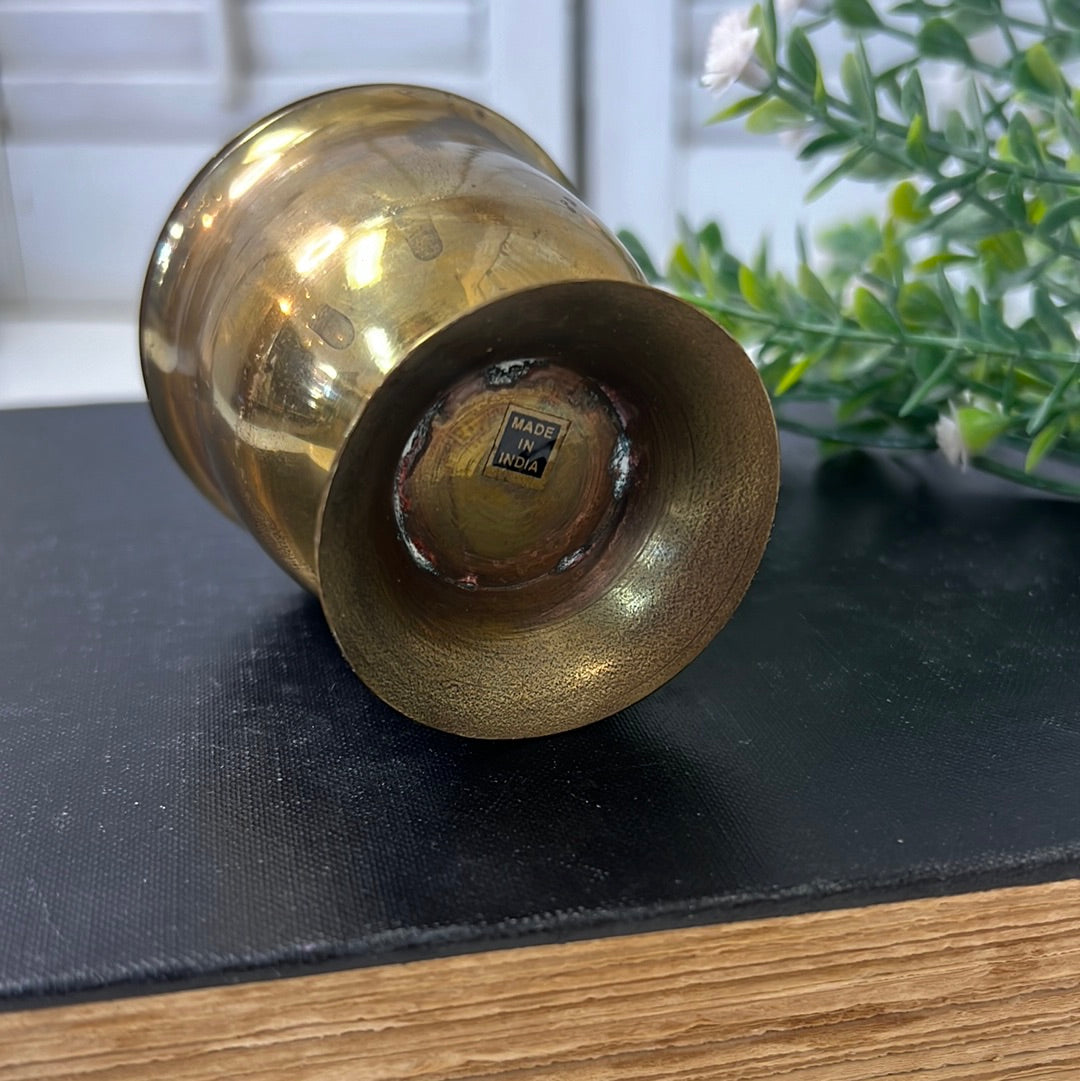 Small brass candleholder with flip top