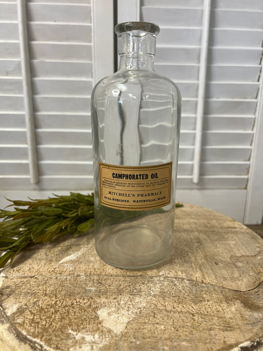 Antique apothecary bottle with original label