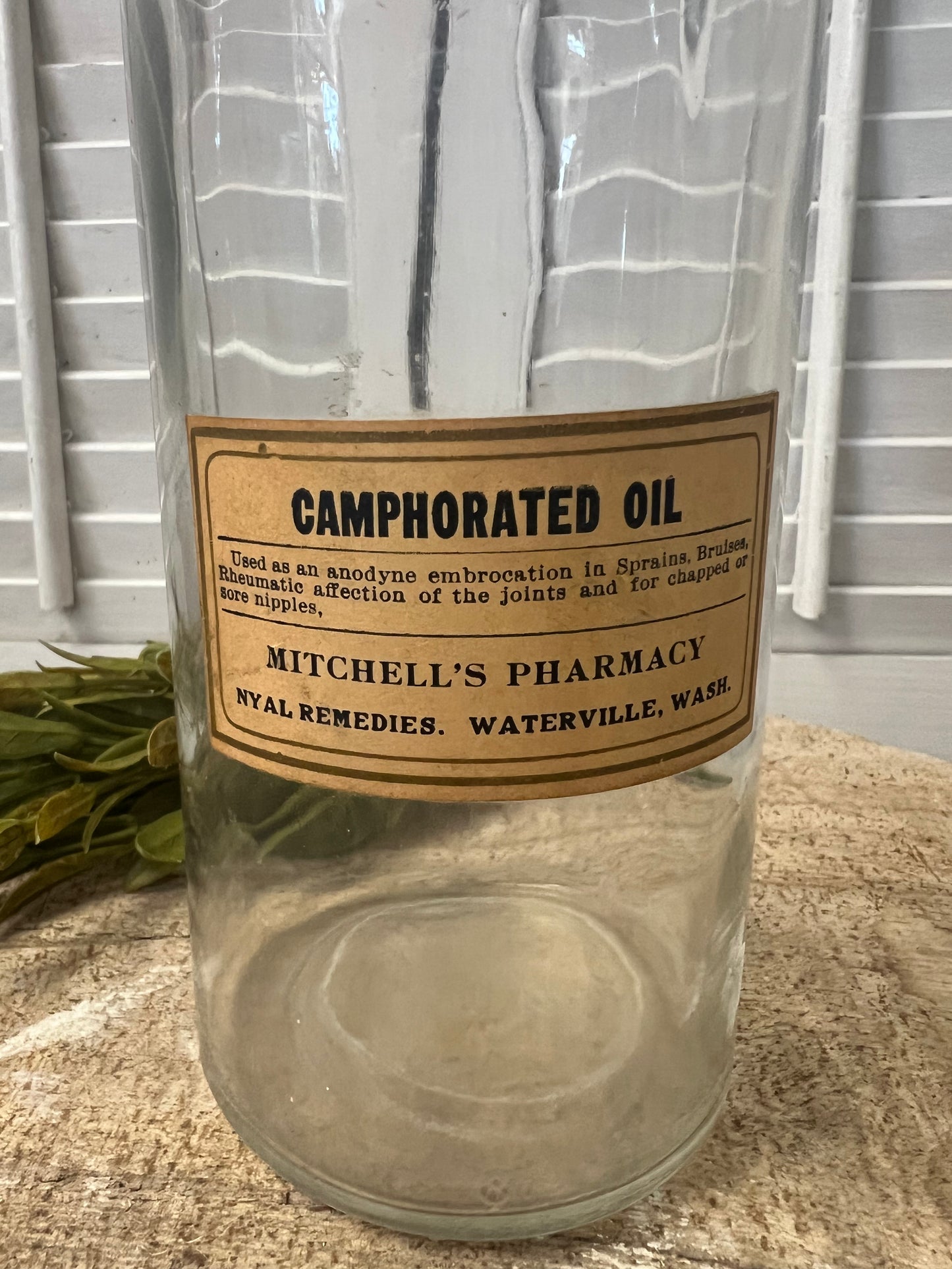 Antique apothecary bottle with original label