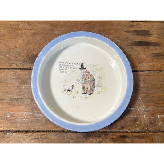 “There was an old woman who lived under a hill”  porcelain child’s feeding dish